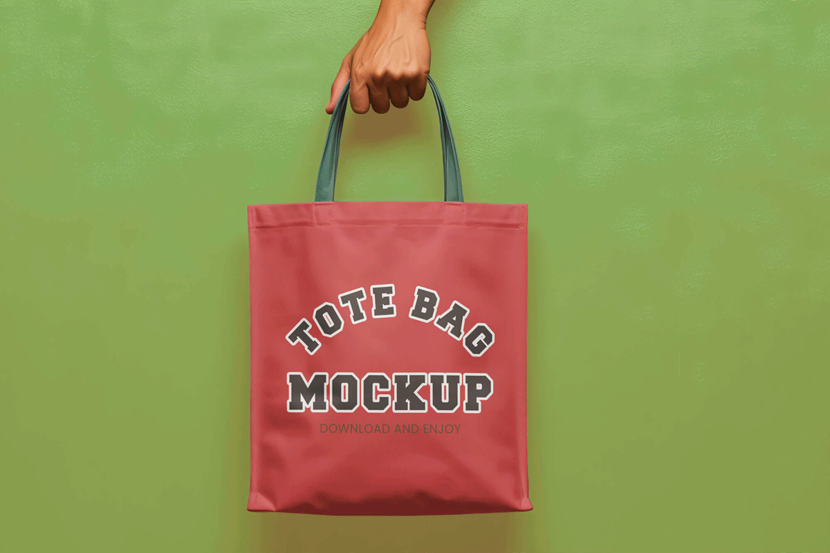 Hand Holding Tote Bag Mockup PSD